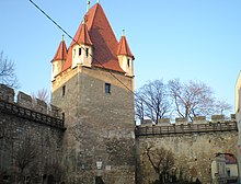 Tower with city wall.