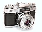 Contaflex Super B, an SLR camera finished in chrome and black leather