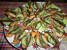 Canapes with smoked sprats, a common Russian zakuska Zakouskis aux sprats.JPG