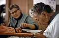 "Broken Fireplace", Older Granddaughter of Iowa Indian Chief White Cloud, Right, Makes Fringe for a Shawl at the Indian Center in the Town of White Cloud, Kansas...10-1974 (4012362384).jpg