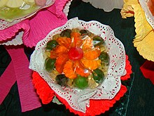 A gelatin dessert containing pieces of fruit