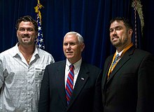Marcus (left) and twin brother Morgan Luttrell, with former Vice President Mike Pence 06292017SE - Unleashing American Energy 315 (35567581872).jpg