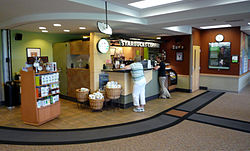 Longtime Starbucks CEO Howard Schultz is an alumnus of NMU. As a result, NMU had the first Starbucks in Michigan's Upper Peninsula (formerly located in the Learning Resource Center). He is pictured in the poster at right. 2009-0618-NMU-Starbucks.JPG