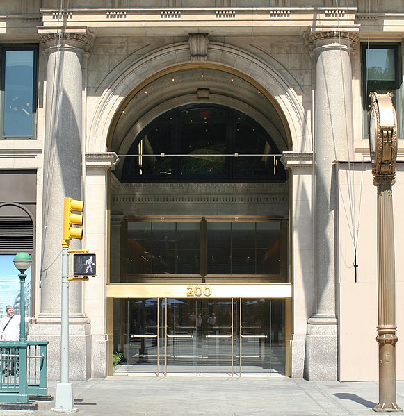 The Toy Center's entrance on Fifth Avenue; the clock seen below is in profile on the right