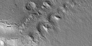 Close view of slopes that contain tilted layered features, as seen by HiRISE under HiWish program. Note: this is an enlargement from the previous image.
