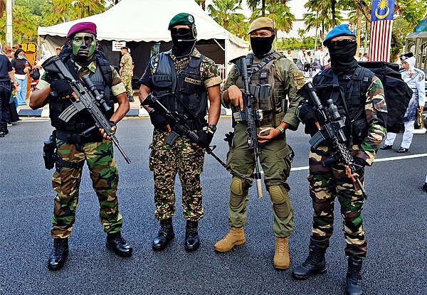 Operatives of PASKAL, GGK, 69 Commando and PASKAU during the 65th Merdeka Day in Kuala Lumpur.