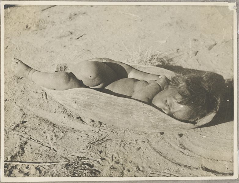 File:Aboriginal child asleep in a wooden dish, central Australia, ca. 1940s (8718150313).jpg