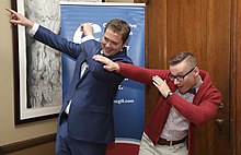 Andrew Scheer, former leader of the Conservative Party of Canada, dabbing with a university student Andrew Scheer at McGill University - 2017 (38701651881).jpg