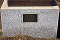 Base and plaque of Ray Warren statue at Dobbyn Park in Junee, New South Wales.