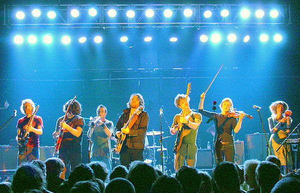Broken Social Scene performing in England in 2006. Left to right: Brendan Canning, Ohad Benchetrit, Torquil Campbell, Kevin Drew, Andrew Whiteman, Jul