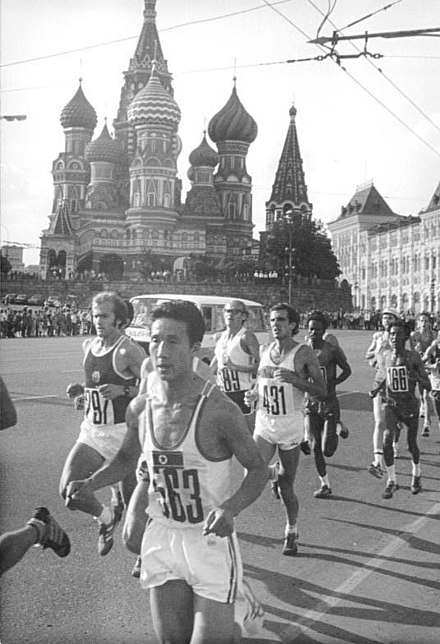 Marathon in front of Saint Basil's Cathedral. The athlete 563 in the foreground is Koh Chun-son from North Korea