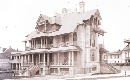 When photographed by George LaGrange Cook in about 1890, the house had not yet been stuccoed. Charles Drayton House c. 1890.PNG