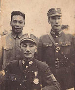 Chiang Kai-shek (front) with sons (rear). Chiang Wei-kuo is on the right.