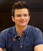 Colfer at a book signing event in August 2013