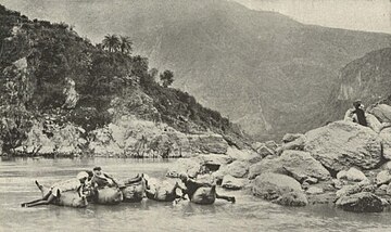 Using inflated animal skins to cross the Sutlej River, c. 1905