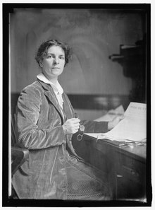 Rheta Childe Dorr with the first edition of "The Suffragist" DORR, MRS. RHETA C., SUFFRAGIST. WITH FIRST EDITION OF 'THE SUFFRAGIST' LCCN2016865037.tif
