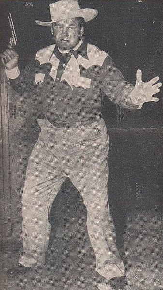 File:Dick Raines gunning for Kashey - 15 May 1950 Minneapolis Audit. Wrestling Program (cropped).jpg