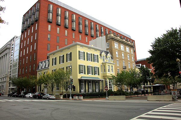 Northeast corner of Lafayette Square. The Howard T. Markey National Courts Building (in red) stands behind the historic Cutts-Madison House (yellow) a