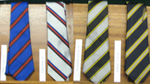 The ties denoting from left to right, Blew house colours, Caerulean Club membership, Ivyholme colours, and Zodiac Club membership DulwichCollegeBoardingHouseColours.png