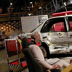 The interior of Test Track shows a simulated test lab, including test dummies and damaged cars before the 2012 refurbishment. Epcot test track test dummy.jpg
