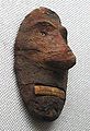 Masque du bassin du Tarim, Xinjiang[N 60], IIe millénaire av. J.-C., retrouvé près de Lop Nor. Musée national de Tokyo.