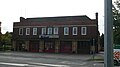 English: Guildford fire station, at the Stoke Crossroads end of Ladymead, Guildford, Surrey.