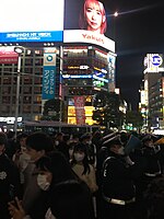 Police officers amidst the crowd on Shibuya Crossing Halloween - 2022 oct 29 various 20 21 00 322000.jpeg