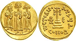 A picture of a golden coin, which shows the Emperor Heraclius, and his sons