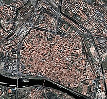 Aerial photo of the historic center of Pavia; the urban plan of the Roman age is evident.