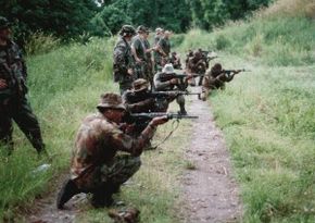 Forces from the Solomon Islands receive instruction on the FN FAL rifle from American Special Forces Jcet.jpg