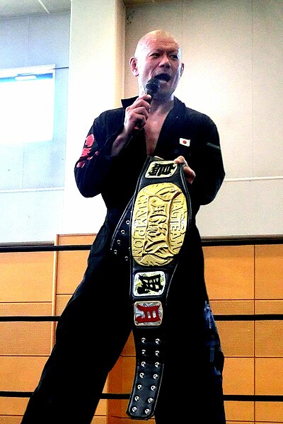Arai as a Furyujin Tag Team Champion in August 2017