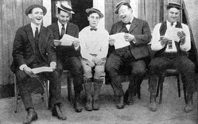 Keaton (center) in 1923 with (from left) writers Joe Mitchell, Clyde Bruckman, Jean Havez, and Eddie Cline