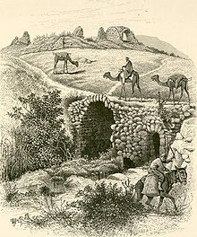 Camels at the Khan and old bridge, Lajjun, Palestine (now in Israel) - 1870s drawing Khan al-Lajjun.jpg