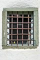 English: Barred window at the northwestern tower Deutsch: Gitterfenster am NW-Turm