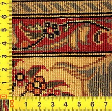 Back side of a Qom rug with very high knot density Knoopdichtheid ghom.jpg