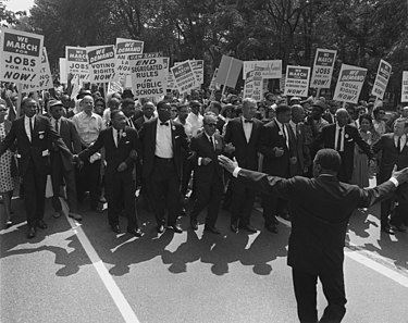 Jewish civil rights activist Joseph L. Rauh Jr. marching with Martin Luther King Jr. in 1963 March on washington Aug 28 1963.jpg