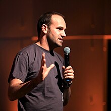 Shuttleworth speaking in 2009 Mark Shuttleworth (2009).jpg