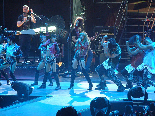 Cyrus performing "Party in the U.S.A."