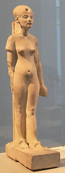 A standing/striding figure of Nefertiti made of limestone. Originally from Amarna, part of the Ägyptisches Museum Berlin collection.