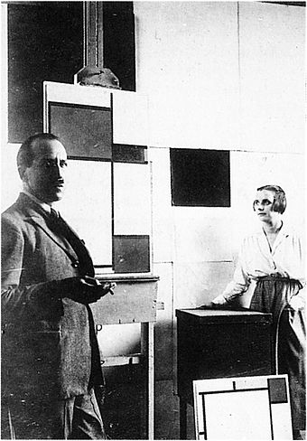 Piet Mondrian and Pétro (Nelly) van Doesburg in Mondrian's Paris studio, 1923