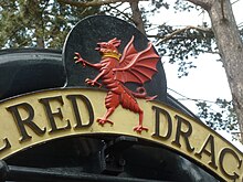 Close-up of the dragon crest, third headboard Red Dragon headboard, central crest close-up, GWSR 2016.jpg