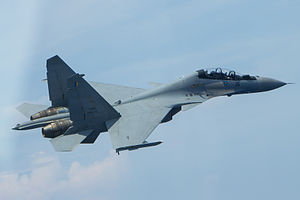 Royal Malaysian Air Force Sukhoi Su-30MKM over the South China Sea in May 2015.JPG