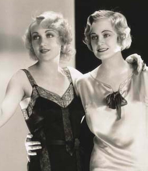 Lombard (left) with Josephine Dunn in Safety in Numbers (1930)