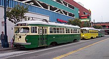 Three PCCs on the San Francisco Municipal Railway's F-line in 2003. Pictured are an example of one double-ended streetcar and two single-ended cars. San Francisco F line streetcars at Jones.jpg