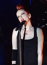 Music critics compared "Red Lips" to the works of the band Garbage, which songwriter Shirley Manson (pictured) is a member of Shirley Manson 2013.jpg