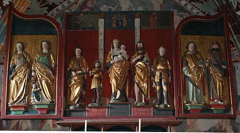 Tríptico escultórico (abierto) en la iglesia de Sogn Gieri (Suiza, siglo XIV).[79]​