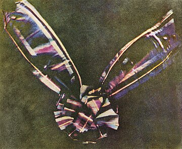 The first durable color photograph, taken by Thomas Sutton in 1861.