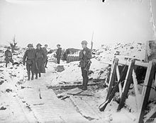 Men of the 15th (Service) Battalion (1st London Welsh), Royal Welsh Fusiliers in the snow-covered front line trenches at Fleurbaix, 28 December 1917. The British Army on the Western Front, 1914-1918 Q8359.jpg