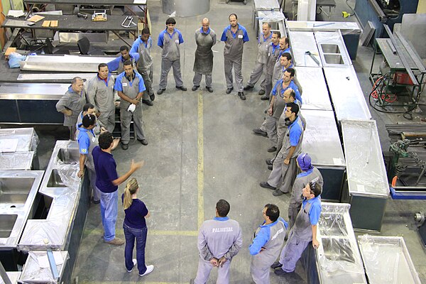 Training meeting in an eco-design stainless steel company in Brazil. The leaders among other things wish to cheer and encourage the workers in order t