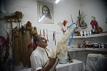 An Umbandist centro in Rio de Janeiro Umbanda e declarada patrimonio imaterial do Rio de Janeiro (30751341242).jpg